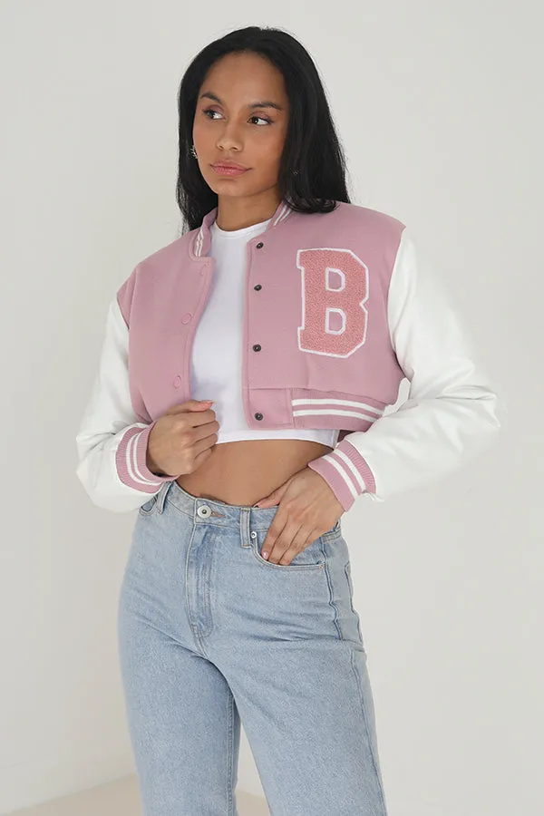 PINK FAUX WOOL LONG SLEEVE CROPPED VARSITY JACKET