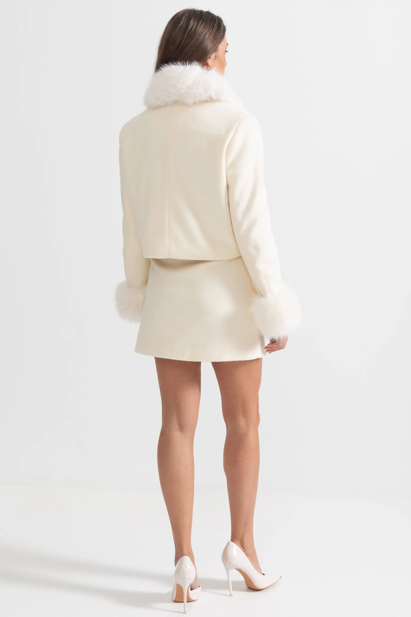 Two-Piece Ensemble With Fur-Trimmed Jacket And Matching Skirt - Beige